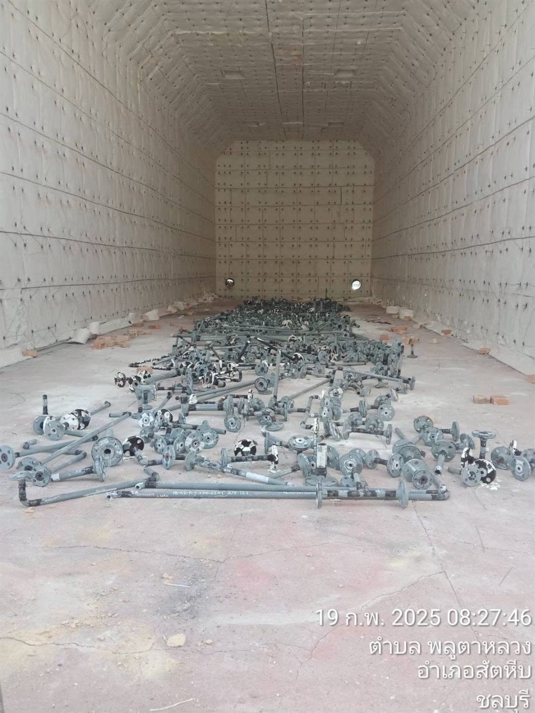 Internal view of a heat treatment furnace with pipework arranged for treatment